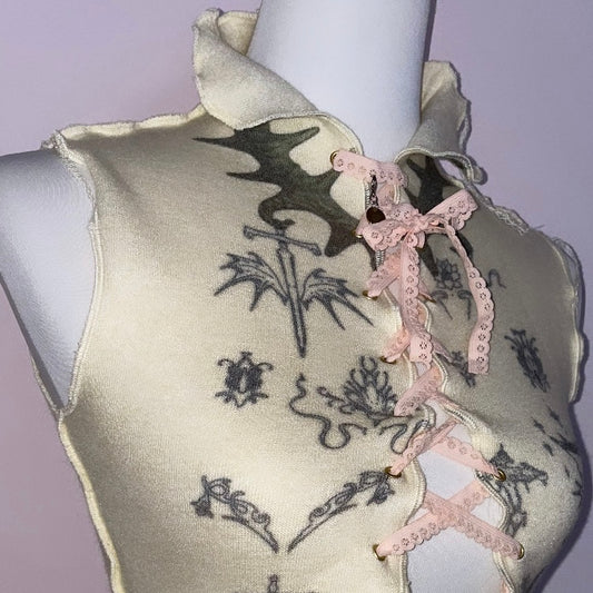 shield vest with protection ┊-˚̩̥̩̥) symbols