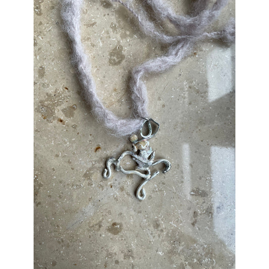 swirly silver necklace