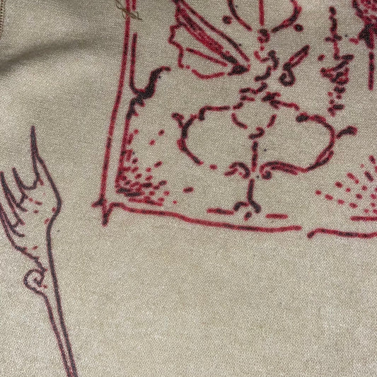 red artifacts knit top